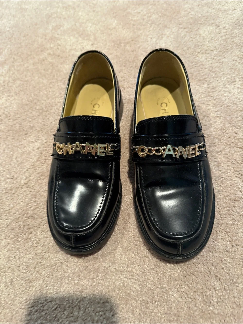 CHANEL Black Leather Logo Chain Loafers